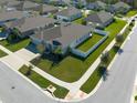 Aesthetic aerial view of a single-Gathering home highlighting its corner lot and landscaped surroundings at 12512 Brick Cobblestone Dr, Riverview, FL 33579