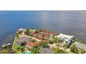 Waterfront property with tennis court and two houses at 5029 W San Miguel St, Tampa, FL 33629