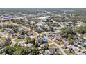 Wide aerial view of the house and surrounding neighborhood at 11081 Montcalm Rd, Spring Hill, FL 34608