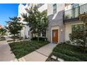 Modern townhome with gray brick exterior and private entrance at 2511 N Grady Ave # 55, Tampa, FL 33607