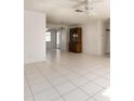 Spacious living room with tile floors and ceiling fan at 14181 89Th Ave, Seminole, FL 33776