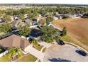 Aerial view showcasing home's location in a residential neighborhood at 474 Rockrose Ct, Spring Hill, FL 34609