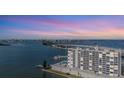 A high-rise building at sunset, overlooking the water and a bridge at 100 Pierce St # 1210, Clearwater, FL 33756