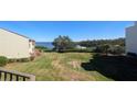 View from condo balcony overlooking the water and greenery at 1515 Pinellas Bayway S # 35, Tierra Verde, FL 33715