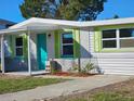 Newly painted home with attractive landscaping at 4021 Eagle Nest Dr, Hernando Beach, FL 34607