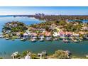 Wide aerial view of waterfront property, showcasing its location and surroundings at 747 Brightwaters Ne Blvd, St Petersburg, FL 33704
