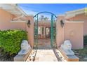 Elegant entryway with ornate gates and lion statues at 1131 Snell Isle Ne Blvd, St Petersburg, FL 33704