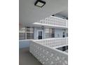 Exterior view of building with balconies and walkways at 4880 Locust Ne St # 234, St Petersburg, FL 33703