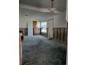 Under renovation, the living room shows exposed walls and flooring at 1858 Mississippi Ne Ave, St Petersburg, FL 33703