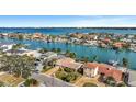 Waterfront property with canal access and lush landscaping at 219 Leeward Is, Clearwater Beach, FL 33767