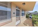 Condo entrance with screen door and windows at 4915 Bay Ne St # 130, St Petersburg, FL 33703