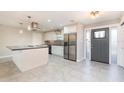 Modern kitchen boasts stainless steel appliances and an island at 2746 Hibiscus St, Sarasota, FL 34239