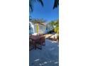 Front yard with patio furniture and walkway to the house at 4801 14Th S Ave, St Petersburg, FL 33711