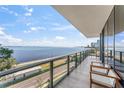 Private balcony offering breathtaking water and city views at 2912 W Santiago St # 404, Tampa, FL 33629
