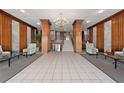 Elegant lobby with seating area and chandelier at 7200 S Sunshine Skyway Ln # 2A, St Petersburg, FL 33711