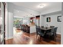Open concept dining area with hardwood floors and modern furnishings at 912 Channelside Dr # 2320, Tampa, FL 33602