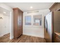 Kitchen with wood cabinets, stainless steel appliances, and water views at 1591 Gulf Blvd # 504S, Clearwater Beach, FL 33767