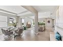 Open concept dining area with view into living room and kitchen at 16027 10Th E Ave, Bradenton, FL 34212