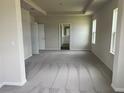Spacious main bedroom with neutral carpet and trim, en-suite bath, and plenty of natural light at 16033 7Th E Ave, Bradenton, FL 34212