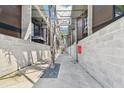 Private alleyway between townhouses with landscaping and modern design at 217 N 12Th St # 112, Tampa, FL 33602