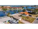 Bird's-eye view of waterfront property and surrounding community at 10 Island Dr, Treasure Island, FL 33706