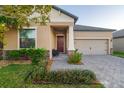 Front porch with seating area and access to the house at 13423 White Sapphire Rd, Riverview, FL 33579