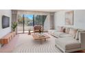 Spacious living room with large windows and comfortable seating at 30 Turner St # 201, Clearwater, FL 33756