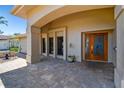 Inviting front porch with a blue heron on the front door at 1997 Kansas Ne Ave, St Petersburg, FL 33703