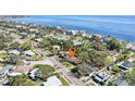 Aerial view of waterfront property with surrounding houses and neighborhood at 3743 Overlook Ne Dr, St Petersburg, FL 33703