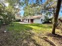 House with a large backyard, perfect for outdoor activities at 621 Hudson Ave, Tampa, FL 33606