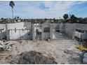 Under-construction home with block walls and concrete foundation, seen from above at 6457 1St Palm Pt, St Pete Beach, FL 33706