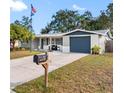 Nice curb appeal with a newly painted exterior and a well-manicured lawn at 4852 Fleetwood St, New Port Richey, FL 34653