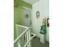 Building entrance with white door and mermaid statue at 4199 38Th S Ave # I, St Petersburg, FL 33711