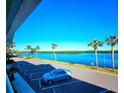 View from balcony showing water, parking lot and car at 611 Destiny Dr # 207, Ruskin, FL 33570