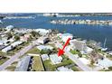 Aerial view showcasing a home's waterfront location at 14140 E Parsley Dr, Madeira Beach, FL 33708