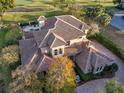 Luxury estate home with tile roof and extensive landscaping at 3703 Douglas Pl, Palm Harbor, FL 34683