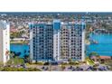 Waterfront condo building, showing exterior and parking at 9415 Blind Pass Rd # 601, St Pete Beach, FL 33706