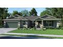 Single-story home with green garage door and stone accents at 142 Fairway Rd, Rotonda West, FL 33947