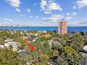 Property location shown with water view and nearby buildings at 2925 W Tambay Ave, Tampa, FL 33611