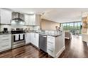 Modern kitchen featuring stainless steel appliances and granite countertops at 900 Cove Cay Dr # 2B, Clearwater, FL 33760