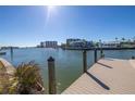 Wooden dock extending into the waterway at 15 Marina Ter, Treasure Island, FL 33706