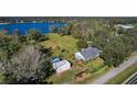 House with detached workshop and large backyard near lake at 3111 Lewis Rd, Dover, FL 33527