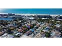 Aerial view showing home's location near the beach and other houses at 130 Lido Dr, St Pete Beach, FL 33706