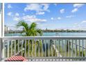 Balcony view overlooking the water with boats and docks at 143 94Th Ave # 2, Treasure Island, FL 33706