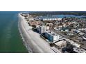 Aerial view of beachfront homes and coastline at 17400 Gulf Blvd # I5, Redington Shores, FL 33708