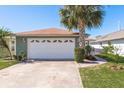 White garage door, well-lit, and clean at 3954 Marine Pkwy, New Port Richey, FL 34652