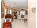 Elegant entryway with a view into the living areas at 5314 Golden Isles Dr, Apollo Beach, FL 33572