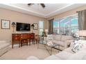 Spacious living room with comfortable seating and large windows at 5314 Golden Isles Dr, Apollo Beach, FL 33572