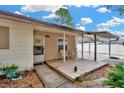 Inviting front porch with wood decking and ample seating at 807 Monaco Dr, Tampa, FL 33613