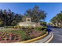 Community entrance sign for Claridge Place with landscaping at 31225 Claridge Pl, Wesley Chapel, FL 33543